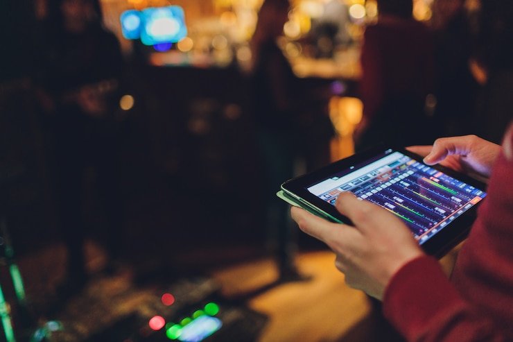 Antarmuka aplikasi mobile dewitoto menampilkan permainan sportsbook dan live casino